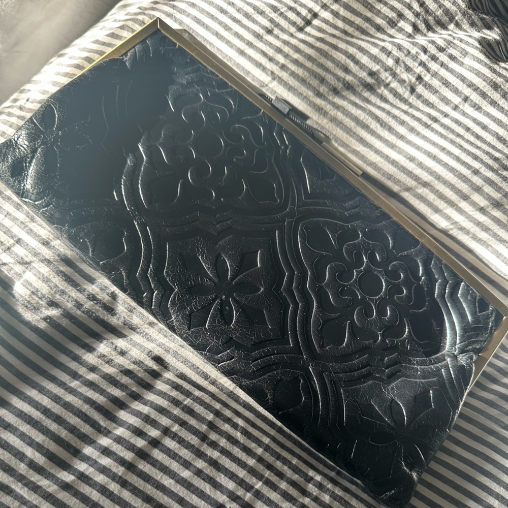 Hobo International black leather embossed clutch